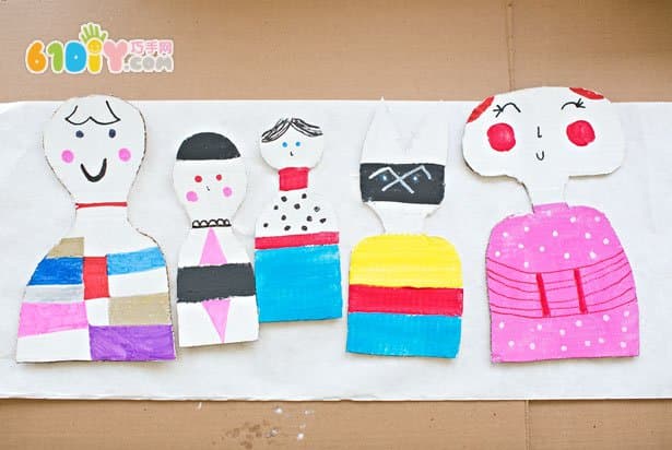 Kids waste making cardboard dolls