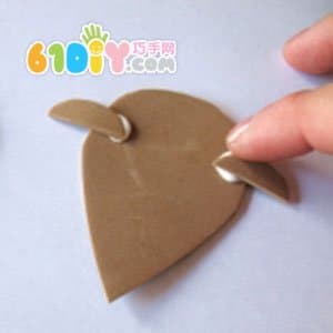 Children making simple reindeer Christmas ornaments