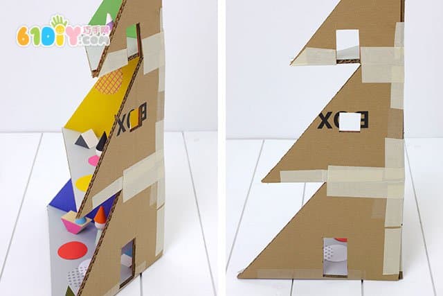 Waste cardboard DIY Christmas tree shaped dolls house