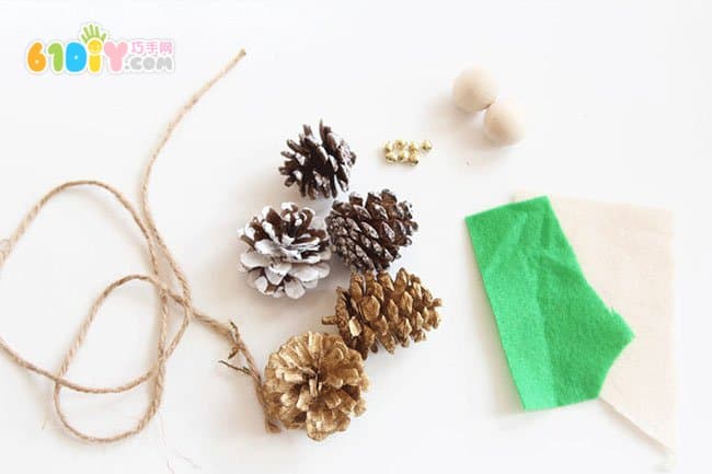 Making Christmas Elf ornaments with pine cones