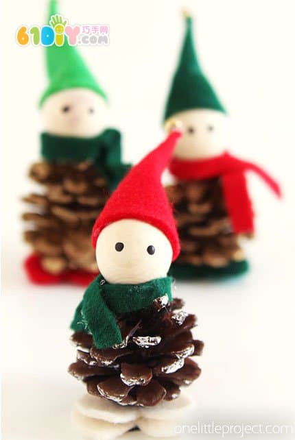 Making Christmas Elf ornaments with pine cones