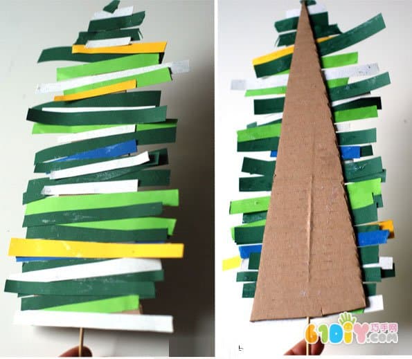 Children's Christmas handmade cardboard waste making Christmas tree