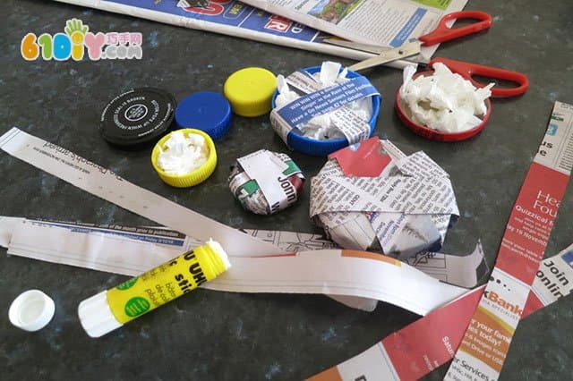 Children make Christmas ornaments with used caps