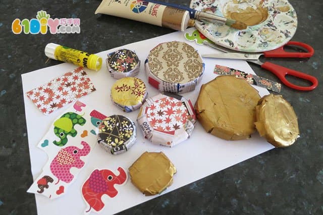 Children make Christmas ornaments with used caps