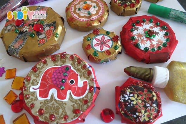 Children make Christmas ornaments with used caps