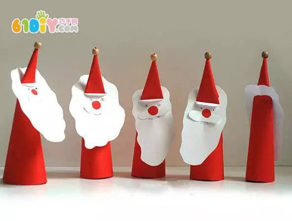 Children making cute three-dimensional paper art Santa Claus