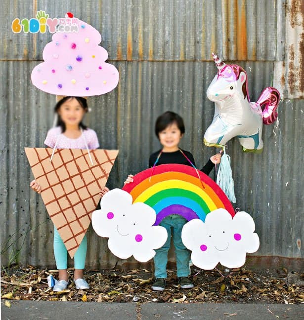 Large handmade waste cardboard making rainbow clouds