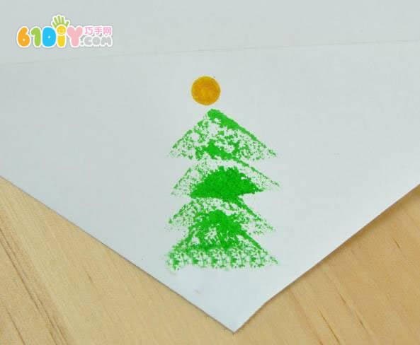 Toddler making beautiful seal Christmas tree greeting card