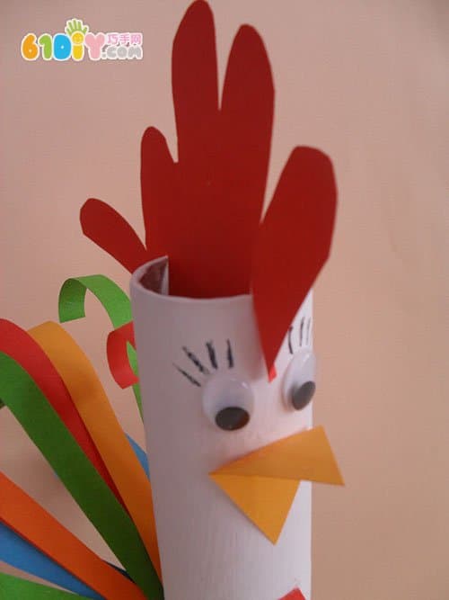 Children make big cocks using paper rolls