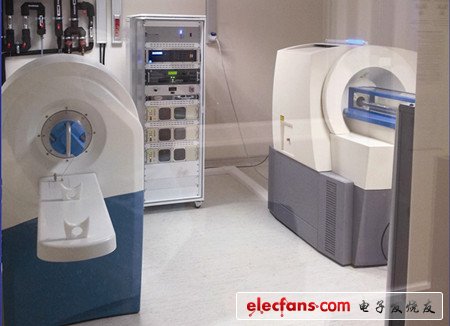 Description: "Because the stray magnetic field is very weak, the new desktop 3T MRI scanner (on the left) can be placed with other scanners in the laboratory"