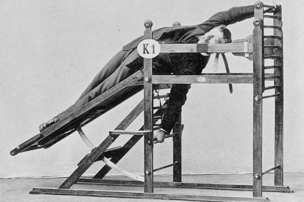 19th century fitness family: equipment like torture equipment gym like prison room (Figure)