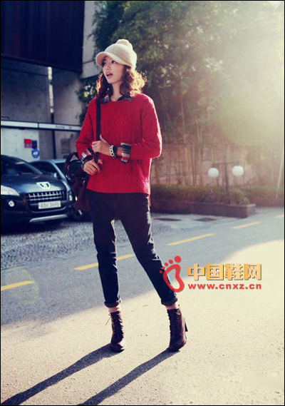 Short loose red twist sweater
