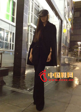 Shawl type black shawl with black leg flared pants, super thin. Plus a hat, very stylish