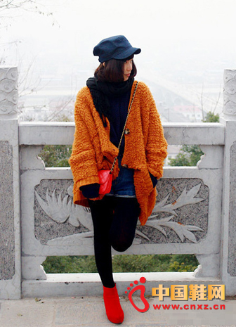 Orange loose knit jacket + hole denim shorts + red boots