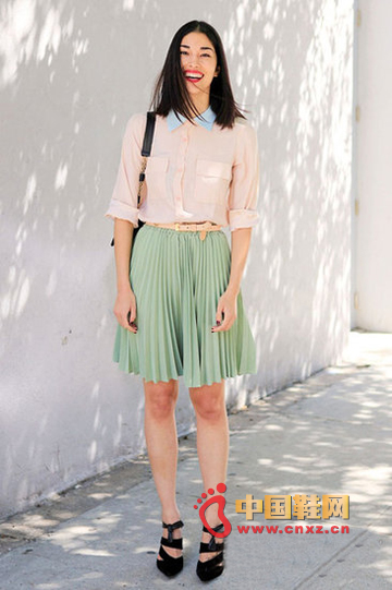 Pink shirt + green pleated skirt