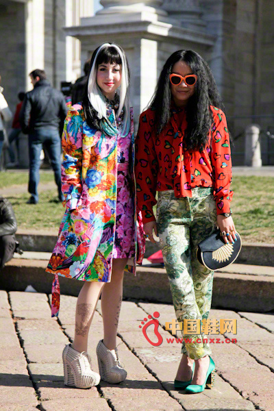 The girl on the left: a printed dress with a printed coat