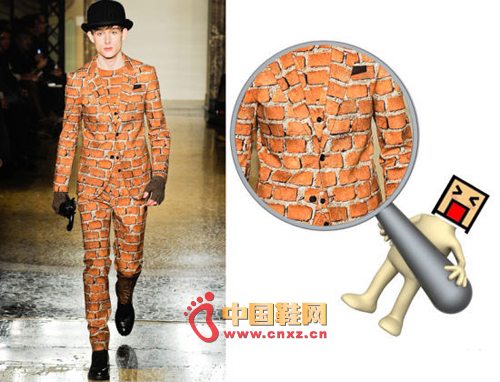 Moschino's "wall" is made of solid, tangible, humorous men who love to wear it!