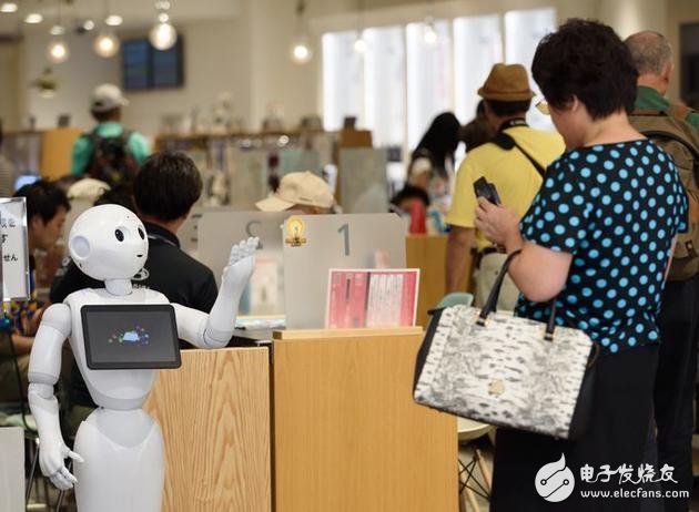 A woman shoots Pepper in a softbank store in Japan