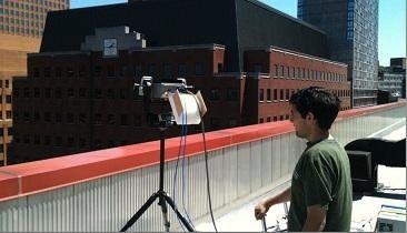 NYU Wireless students install wireless devices on the roof