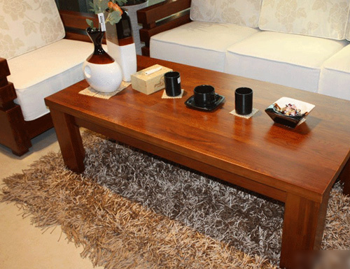 Small coffee table University asked how to stage a home feng shui drama under the tea cup