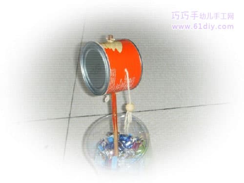 Toy handmade - rattle made from scrap cans