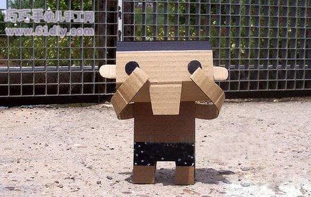 Cute little doll made of waste cardboard 11