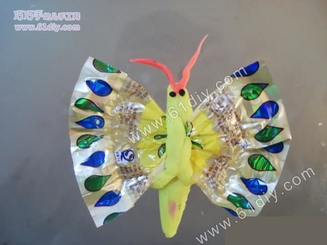 Colorful mud candy paper butterfly and peacock