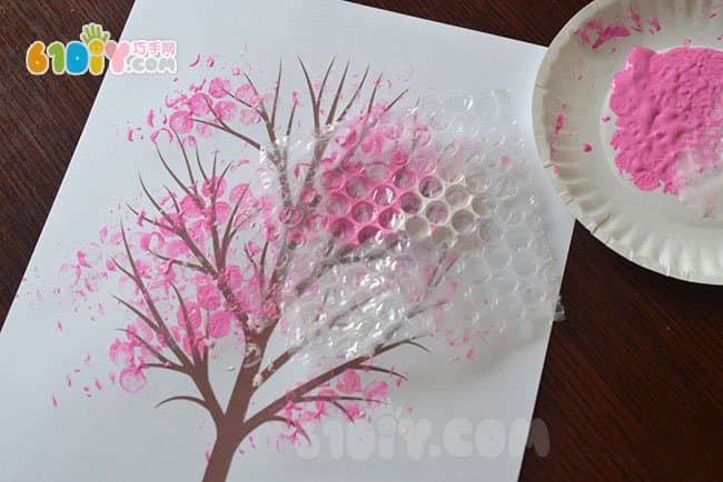 Spring children creative painting peach tree