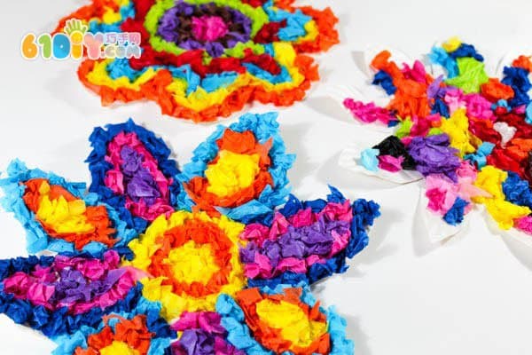 Children making spring colorful flowers