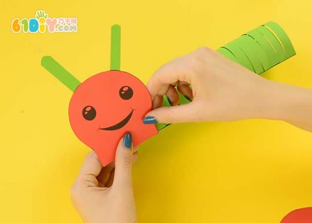 Children's handmade three-dimensional paper caterpillar