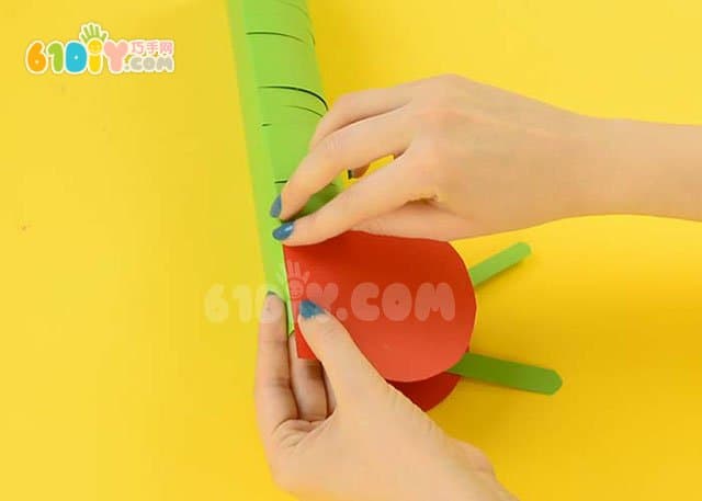 Children's handmade three-dimensional paper caterpillar