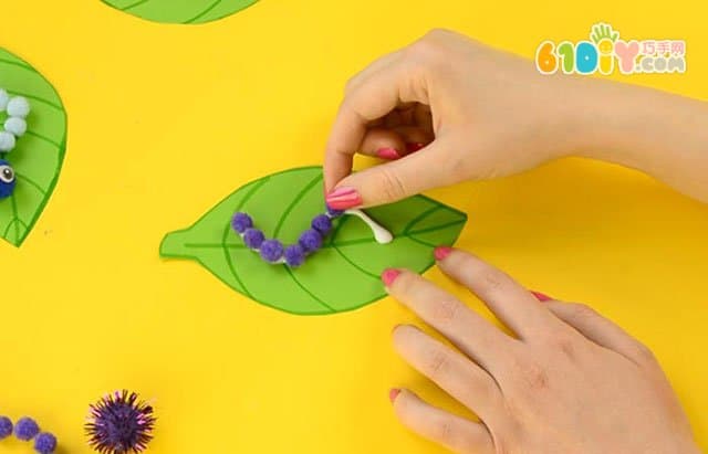 Caterpillars on young children's DIY leaves