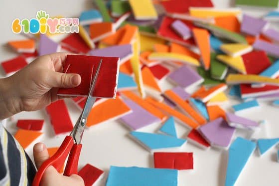 Young children make art paintings using waste lunch boxes