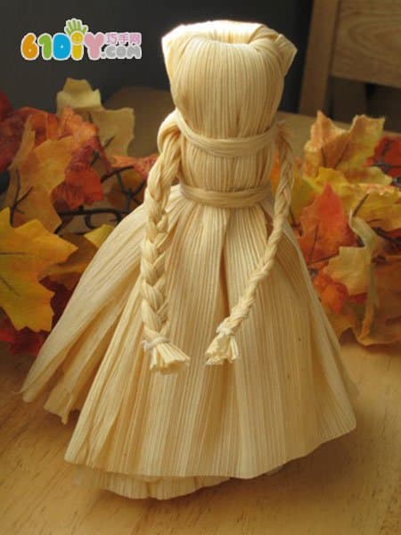 Handmade simple doll with corn leaves