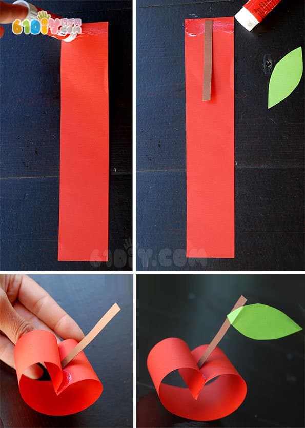 Child making stereo cardboard apple