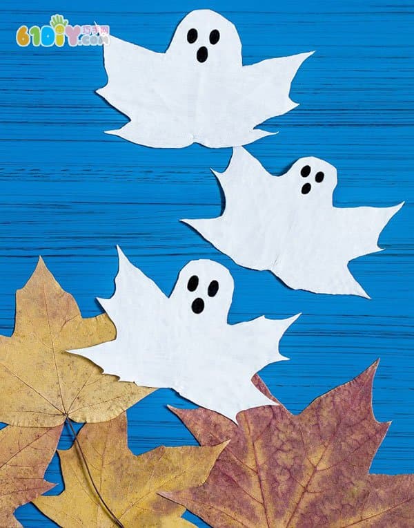 Children use the leaves to make Halloween ghosts