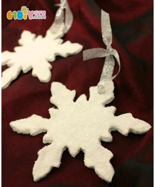 Children's winter handmade salt dough making beautiful snowflakes