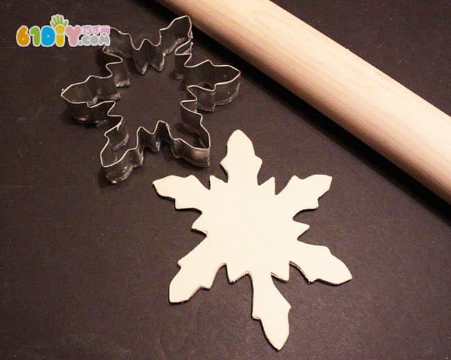 Children's winter handmade salt dough making beautiful snowflakes