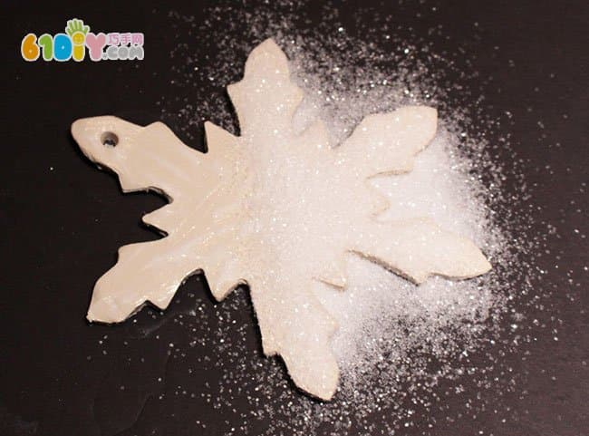 Children's winter handmade salt dough making beautiful snowflakes