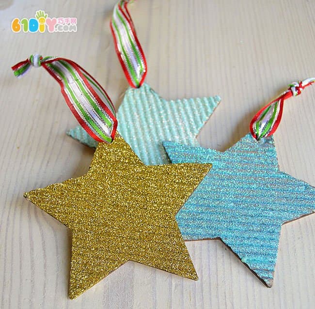 Children making Christmas shiny star ornaments