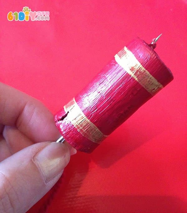 Waste making new year handmade firecracker ornaments