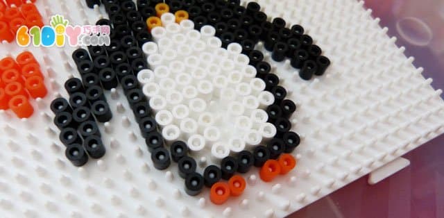 Spelling peas handmade three-dimensional penguins