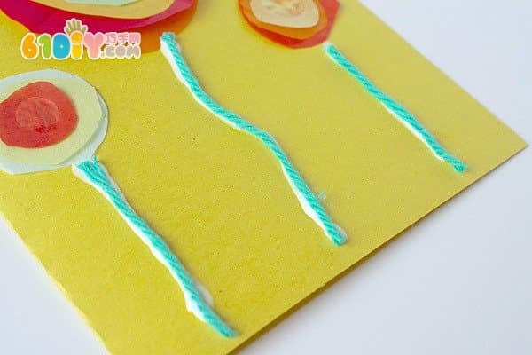 Toddler making mother's day greeting card