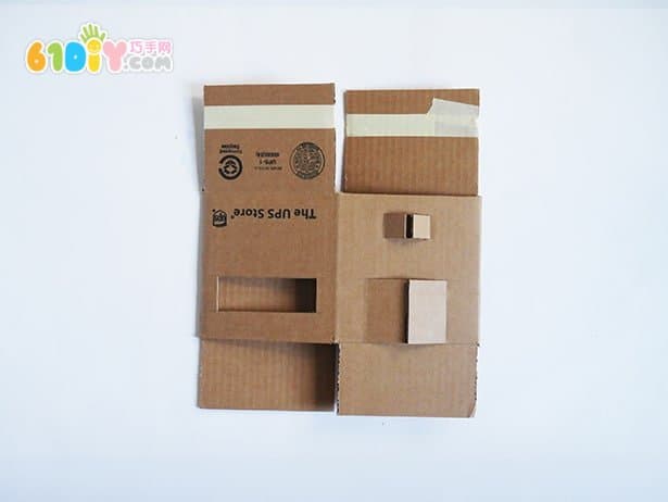 Waste cardboard handmade three-dimensional farm barn scene