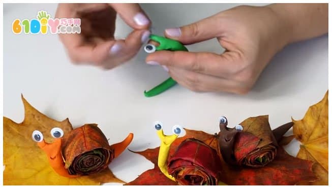 Children's handmade leaf clay snail