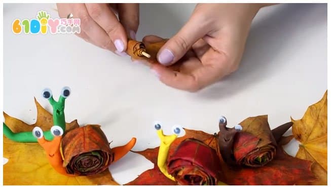 Children's handmade leaf clay snail