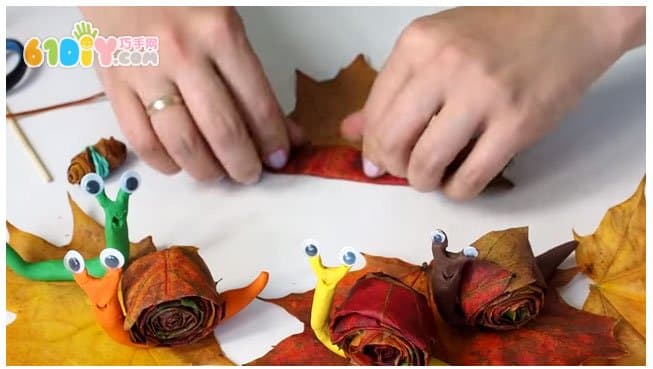 Children's handmade leaf clay snail