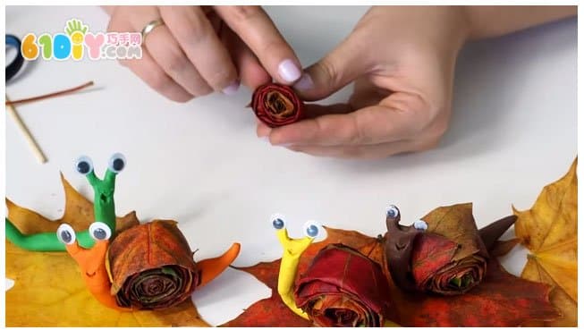 Children's handmade leaf clay snail