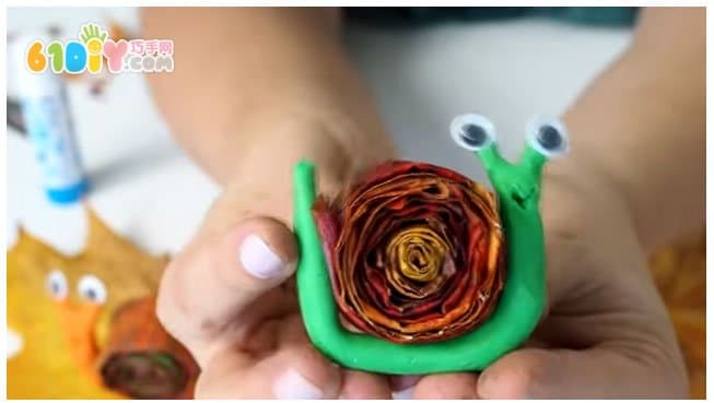 Children's handmade leaf clay snail