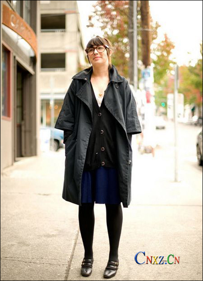 Putting hands in pockets to stay warm